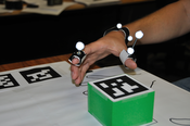 image1: Shows the green box and the markers for hand tracking