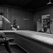 Frame from animation movie; thug entering a western bar
